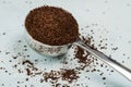 Ground Coffee Spilled from a Scoop Royalty Free Stock Photo