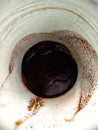 Coffee grounds in a cup, looking fortunes with a coffee cup