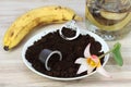 Coffee grounds from espresso coffee capsules and banana peels for better growing