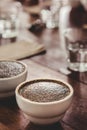 coffee grounds with hot water in the ceramic cup on the table is preparing for professional Q Grader to testing and inspecting the Royalty Free Stock Photo