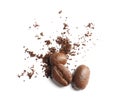 Coffee grounds and roasted beans on white background Royalty Free Stock Photo