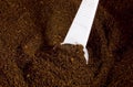 Coffee grounds with scoop Royalty Free Stock Photo