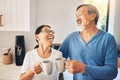 Coffee, happy and senior couple in kitchen with hot beverage, tea and caffeine for breakfast. Marriage, retirement and Royalty Free Stock Photo