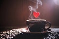Coffee Heart A cup of coffee with a heart shape floating above it symbolizing affection Royalty Free Stock Photo