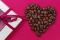 Coffee heart, roasted coffee beans and chocolate. Concept of Valentine`s Day, good mood, Endorphins, greeting cards Royalty Free Stock Photo