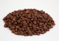 Coffee. Hill coffee beans on a white background. Royalty Free Stock Photo