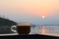 Morning coffee background sunset with mountain. orange sun. Royalty Free Stock Photo