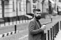 Coffee is a hug in a mug. Businessman in hipster style holding takeaway coffee. Drinking his cup first thing in morning Royalty Free Stock Photo