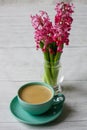 Coffee and hyacinth flowers Royalty Free Stock Photo