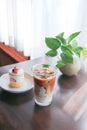 coffee, iced coffee or iced cappuccino coffee and strawberry shortcake on the table Royalty Free Stock Photo
