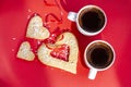 Two cups of coffee on red background, love, valentine day, strong coffee - strong love family, dating romance Royalty Free Stock Photo