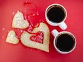 Two cups of coffee on red background, love, valentine day, strong coffee - strong love family, dating romance Royalty Free Stock Photo