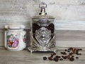 Coffee jars on bleached oak wooden shelf porcelain and glass silver vintage sterling.