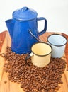 Coffee kettle cups and beans with white background Royalty Free Stock Photo