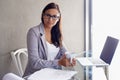 Coffee, laptop and portrait of business woman in office with confident and pride attitude. Technology, serious and Royalty Free Stock Photo