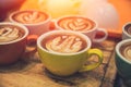 Coffee latte art popular hot drink served on wood table