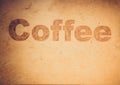 coffee lettering on wood background