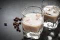 Coffee liqueur in glasses with ice and coffee beans. Royalty Free Stock Photo