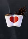 Coffee Love Poster Template. White Ripple Cups with a Red Heart and Splash on a Black Background Royalty Free Stock Photo