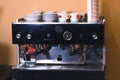 Coffee machine in coffee on a blurred background. Royalty Free Stock Photo