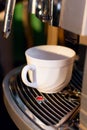 Coffee machine and cup