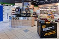 Coffee machine with different pastries and fast food snacks in Narvesen shop.