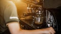 Coffee machine, Espresso machine pours fresh black coffee closeup, Barista make coffee latte art with espresso machine in cafe Royalty Free Stock Photo