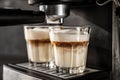 Coffee machine making latte, closeup Royalty Free Stock Photo