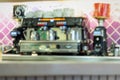 Coffee machine for the preparation of espresso coffee in a coffee shop. Blurred for use as a textured background Royalty Free Stock Photo