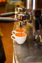 Coffee machine prepares espresso in to glass