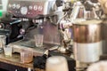 Coffee machine ready to make good a cup of espresso in cafe. coffee machine making a cup of coffee in restaurant. Royalty Free Stock Photo