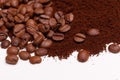 coffeeCoffee beans and ground coffee on white background Royalty Free Stock Photo