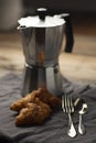 coffee maker and croissants on wooden table Royalty Free Stock Photo