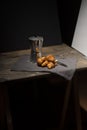 coffee maker and croissants on wooden table Royalty Free Stock Photo