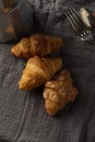 coffee maker and croissants on wooden table Royalty Free Stock Photo