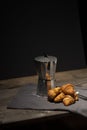 coffee maker and croissants on wooden table Royalty Free Stock Photo