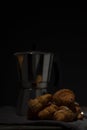 coffee maker and croissants on wooden table Royalty Free Stock Photo