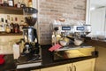 Coffee maker and espresso machine at restaurant counter Royalty Free Stock Photo