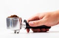 Coffee maker horn in hand on white background, close-up, isolated Royalty Free Stock Photo