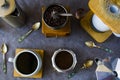 Coffee makers and beans, cup of coffee and spoons Royalty Free Stock Photo