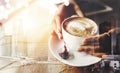 Coffee makes everything possible. Closeup shot of an unrecognizable woman having a cup of coffee at a cafe.