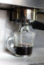 Coffee making process from coffee machine Royalty Free Stock Photo