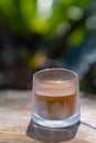 Coffee Menu called Dirty Coffee a Glass of Ristretto Coffee shot on Cold Milk