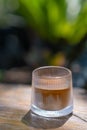 Coffee Menu called Dirty Coffee a Glass of Ristretto Coffee shot on Cold Milk