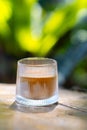 Coffee Menu called Dirty Coffee a Glass of Ristretto Coffee shot on Cold Milk