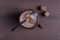 Coffee with milk in a fired earthenware mug Royalty Free Stock Photo