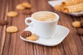 Coffee with milk in white cup Royalty Free Stock Photo