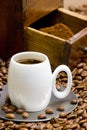 Coffee mill with coffee beans Royalty Free Stock Photo