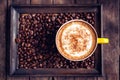 Coffee mocha hot and coffee beans on wooden table