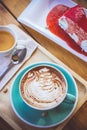 coffee mocha lattee cup on wood table and cake relax time on cafe shop Royalty Free Stock Photo